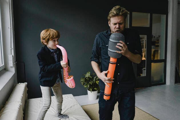 Father and son playing fun instruments model released Symbolfoto property released  KNSF06280