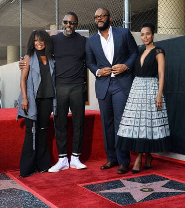 Actor and filmmaker Tyler Perry (3rd-L) is joined by actors Crystal Fox, Idris Elba and Kerry Washington (L-R) during an unveiling ceremony honoring Perry with the 2,675th star on the Hollywood Walk of Fame in Los Angeles on Tuesday, October 1, 2019.  LAP2019100114 JIMxRUYMEN