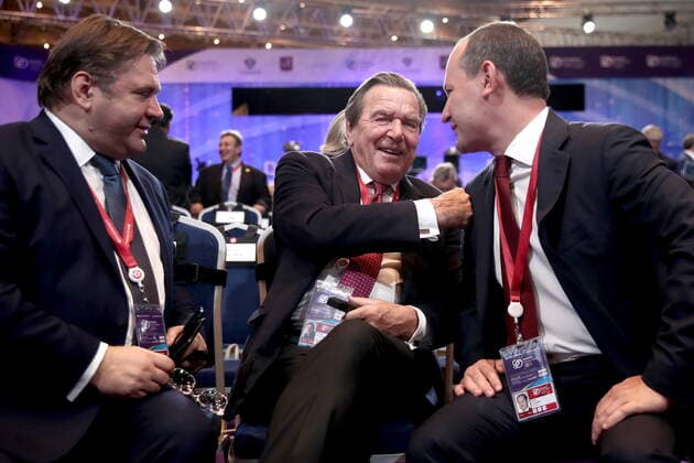 MOSCOW, RUSSIA - OCTOBER 2, 2019: Russia s Special Presidential Envoy on International Cooperation in the Electric Power Industry, Sergei Shmatko, Nord Stream 2 Board Chairman, former German Chancellor Gerhard Schroeder, and Rosseti Director General Pavel Livinsky (L-R) ahead of the plenary session titled Energy Partnership for Sustainable Growth as part of the Russian Energy Week 2019 international forum at the Manege Central Exhibition Hall. Valery Sharifulin TASS  TS0BD357