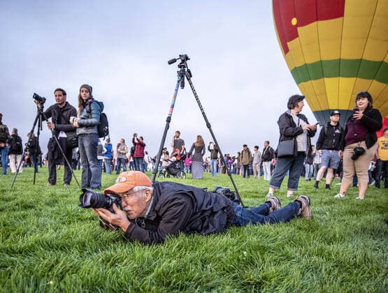 October 5, 2019, Albuquerque, New Mexico, USA: October 10 05, 2019, .The 2019 Albuquerque International Balloon Fiesta got off to a rocky start with heavy fog preventing balloonist from launching on the first day of the event. Most inflated for a static display. Nevertheless, it was spectacular morning for first time Fiesta goers. Pictured is Akira Otaka(Cq), a photographer from Japan who has been photographing each balloon fiesta since 1992..Albuquerque, New Mexico. Albuquerque Journal Albuquerque USA - ZUMAab1_ 20191005_zaf_ab1_006 Copyright: xRobertoxE.xRosalesx