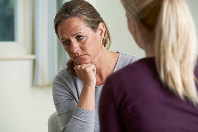 Mature Woman Discussing Problems With Counselor,model released, Symbolfoto ING_39524_04602