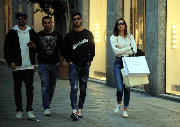 Milan, Marco Asensio and girlfriend Sandra Garal in the center Marco Asensio footballer of REAL MADRID and of the national SPAIN, caught walking around the downtown streets. Here he goes shopping in the streets of the fashion district with his girlfriend SANDRA GARAL. First by Gio Moretti, then by Dolce & Gabbana, then they notice the presence of the photographers and decide to return to the hotel.  Copyright: xMimmoxCarrierox xIPAx xMimmoxCarrierox