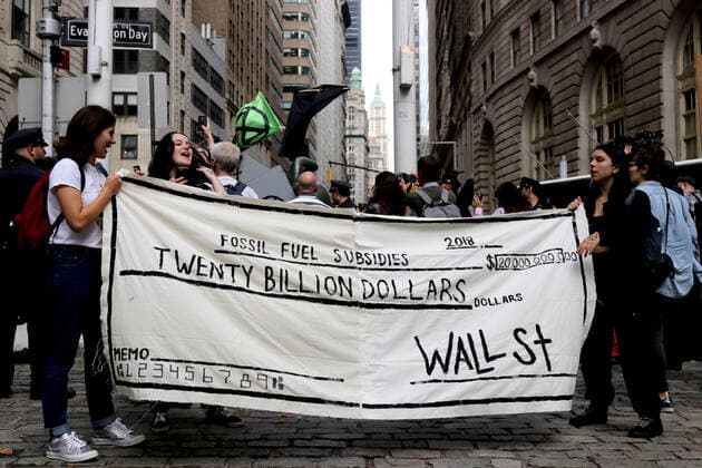 October 7, 2019, New York City, New York, US: Climate action group Extinction Rebellion launched a series of climate change protests around the globe on 7 October 2019, that featured large numbers of New York climate activists descending on lower Manhattan in actions that saw the iconic Charging Bull statute showered In Fake Blood and a die-in at the New York Stock Exchange on Wall Street, resulted in many arrests. New York City US - ZUMAl135 20191007_zap_l135_013 Copyright: xG.xRonaldxLopezx
