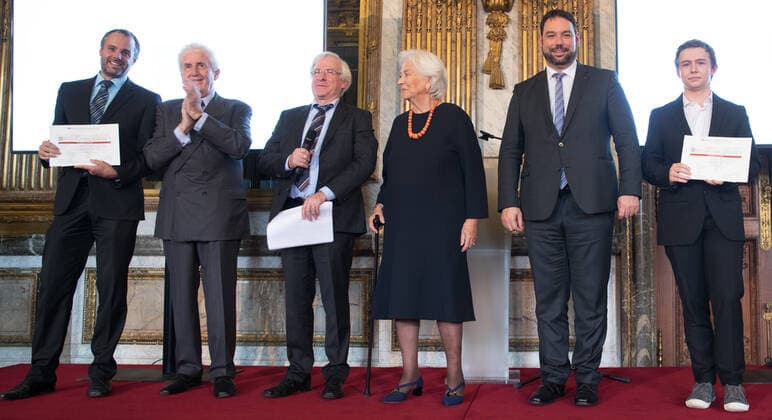 Comte Bernard de Traux de Wardin (2L), Guy Fickers (3L), Queen Paola of Belgium and Marvin Knops from St Vith Technisches Institut (R) pose for photographers during a royal visit to the ceremony ceremony for the Terre d avenir Focus Aarde science awards in Brussels Academy palace, Wednesday 09 October 2019. This award is an initiative of Queen Paola foundation organised in collaboration with Dirk Frimout foundation.  BENOITxDOPPAGNE 05683388