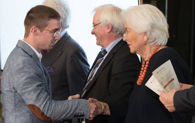 Marvin Knops from St Vith Technisches Institut (L), Guy Fickers and Queen Paola of Belgium pictured during a royal visit to the ceremony ceremony for the Terre d avenir Focus Aarde science awards in Brussels Academy palace, Wednesday 09 October 2019. This award is an initiative of Queen Paola foundation organised in collaboration with Dirk Frimout foundation.  BENOITxDOPPAGNE 05683401