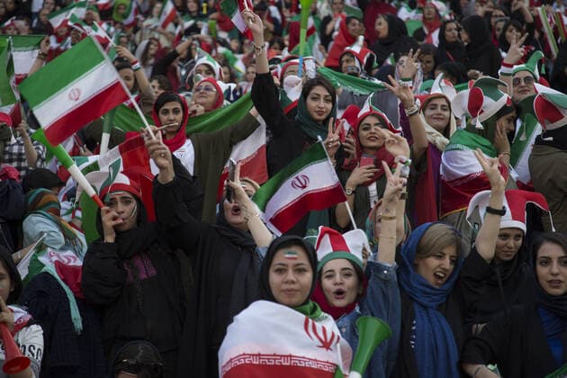 October 10, 2019, Tehran, Iran: Iranian women cheer during a soccer match between their national team and Cambodia in the 2022 World Cup qualifier at the Azadi (Freedom) Stadium in Tehran, Iran. Iranian women were freely allowed into the stadium for the first time in decades. The decision follows the death of a young woman who set herself on fire after hearing she could face prison time for sneaking into an Iranian soccer match disguised as a man. Tehran Iran - ZUMAf146 20191010_zip_f146_025 Copyright: xRouzbehxFouladix