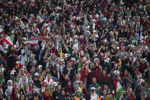 October 10, 2019, Tehran, Iran: Iranian women cheer during a soccer match between their national team and Cambodia in the 2022 World Cup qualifier at the Azadi (Freedom) Stadium in Tehran, Iran. Iranian women were freely allowed into the stadium for the first time in decades. The decision follows the death of a young woman who set herself on fire after hearing she could face prison time for sneaking into an Iranian soccer match disguised as a man. Tehran Iran - ZUMAf146 20191010_zip_f146_034 Copyright: xRouzbehxFouladix