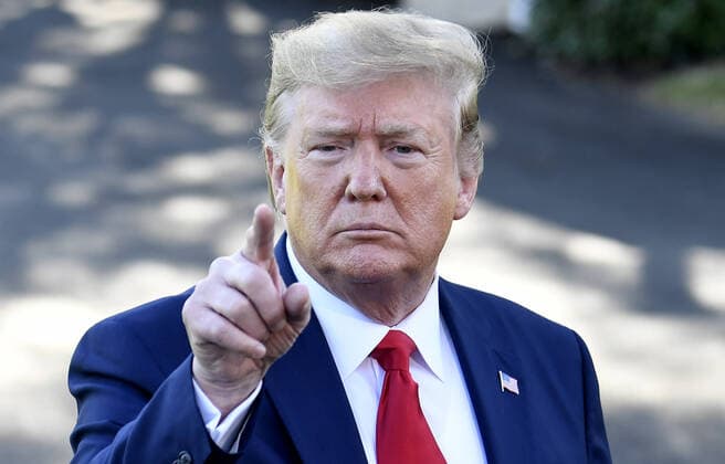 President Donald Trump calls on a reporter as he answers questions prior to departing the White House, Thursday, October 10, 2019, in Washington, DC. Trump is attending an evening campaign rally in Minneapolis, Minnesota.  WAP20191010506 MIKExTHEILER