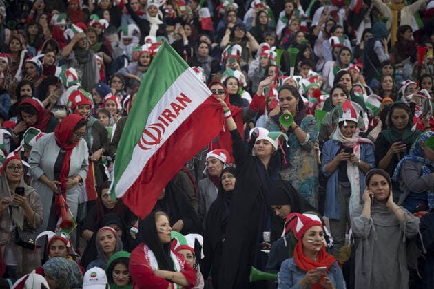 October 10, 2019, Tehran, Iran: Iranian women cheer during a soccer match between their national team and Cambodia in the 2022 World Cup qualifier at the Azadi (Freedom) Stadium in Tehran, Iran. Iranian women were freely allowed into the stadium for the first time in decades. The decision follows the death of a young woman who set herself on fire after hearing she could face prison time for sneaking into an Iranian soccer match disguised as a man. Tehran Iran - ZUMAf146 20191010_zip_f146_071 Copyright: xRouzbehxFouladix