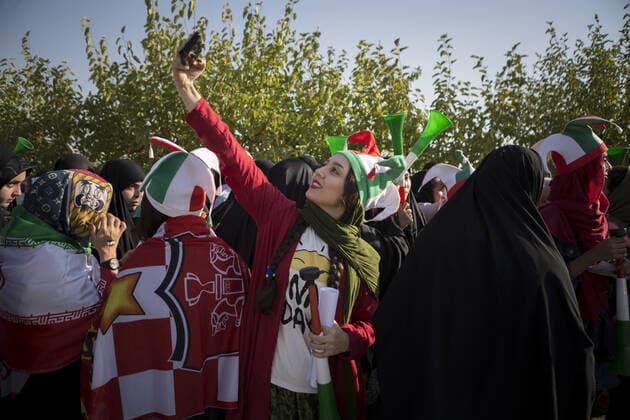 October 10, 2019, Tehran, Iran: Iranian women cheer as they arrive at the Azadi Stadium to watch the 2022 World Cup qualifier soccer match between Iran and Cambodia, in Tehran, Iran. Iranian women were freely allowed into the stadium for the first time in decades. They had been banned since 1981. Tehran Iran - ZUMAf146 20191010_zip_f146_043 Copyright: xRouzbehxFouladix