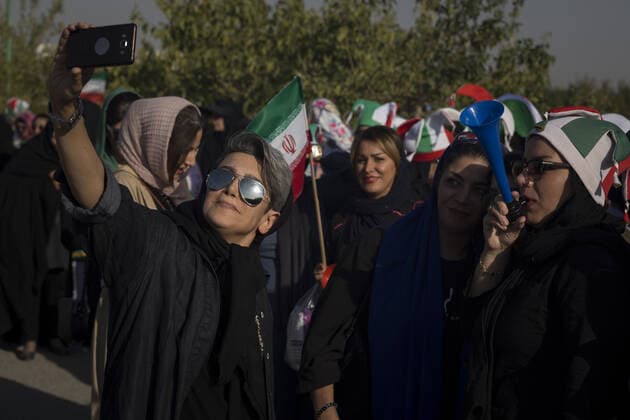 October 10, 2019, Tehran, Iran: Iranian women cheer as they arrive at the Azadi Stadium to watch the 2022 World Cup qualifier soccer match between Iran and Cambodia, in Tehran, Iran. Iranian women were freely allowed into the stadium for the first time in decades. They had been banned since 1981. Tehran Iran - ZUMAf146 20191010_zip_f146_057 Copyright: xRouzbehxFouladix