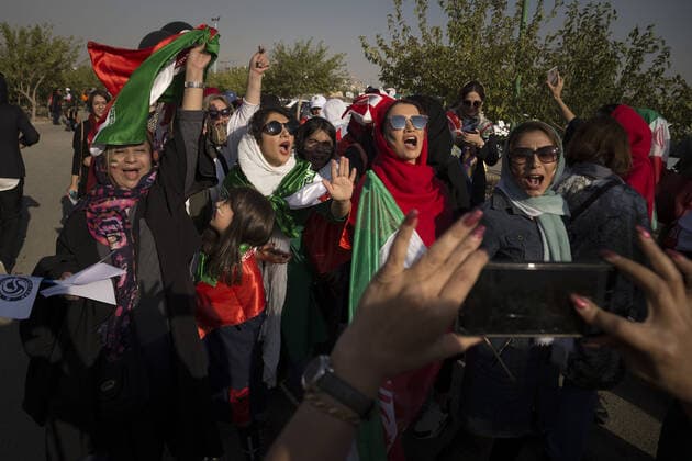 October 10, 2019, Tehran, Iran: Iranian women cheer as they arrive at the Azadi Stadium to watch the 2022 World Cup qualifier soccer match between Iran and Cambodia, in Tehran, Iran. Iranian women were freely allowed into the stadium for the first time in decades. They had been banned since 1981. Tehran Iran - ZUMAf146 20191010_zip_f146_059 Copyright: xRouzbehxFouladix
