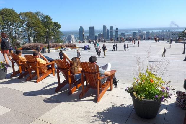 The viewing platform of the Mont Royal mountain in Montreal, Canada below the Chalet du Mont Royal Here you have a wide view of the skyscrapers of the megacity