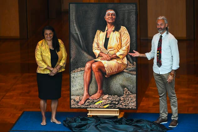 NOVA PERIS PORTRAIT UNVEILING, Former Labor senator Nova Peris (left) poses for a photograph next to her official portrait with Aboriginal artist Dr Jandamarra Cadd at Parliament House in Canberra, Wednesday, October 16, 2019. ( NO ARCHIVING, EDITORIAL USE ONLY, NO USE IN BOOKS WITHOUT CONSENT CANBERRA ACT AUSTRALIA  Copyright: xLUKASxCOCHx 20191016001426862432