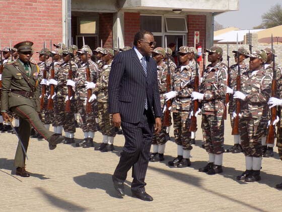 (191017) -- OKAHANDJA (NAMIBIA), Oct. 17, 2019 (Xinhua) -- Namibian President Hage Geingob (R, front) inspects the guard of honor at the Chinese-funded Namibia Command and Staff College in Okahandja, Namibia, on Oct. 17, 2019. Namibian President Hage Geingob on Thursday inaugurated the Chinese-funded Namibia Command and Staff College in Okahandja, 70 km away from the capital city of Windhoek. (Photo by Musa C Kaseke Xinhua) NAMIBIA-OKAHANDJA-GEINGOB-CHINESE-FUNDED MILITARY COLLEGE 