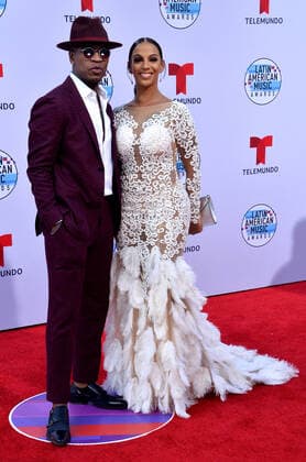 Singer Ne-Yo (L) and Crystal Renay arrive for the fifth annual Latin American Music Awards at the Dolby Theatre in the Hollywood section of Los Angeles on Thursday, October 17, 2019. The annual event honors outstanding achievements for artists in the Latin music industry.  LAP20191017229 JIMxRUYMEN
