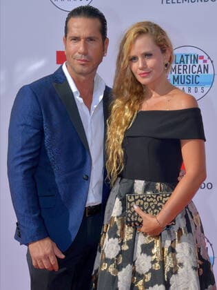 Actor Gregorio Pernia and guest arrive for the fifth annual Latin American Music Awards at the Dolby Theatre in the Hollywood section of Los Angeles on Thursday, October 17, 2019. The annual event honors outstanding achievements for artists in the Latin music industry.  LAP20191017019 JIMxRUYMEN