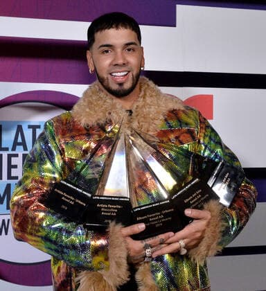 Anuel AA appears backstage with his awards for Artist of the Year, Album of the Year for Real Hasta La Muerte, Favorite Artist - Male, Favorite Artist - Urban, and Favorite Album - Urban for Real Hasta La Muerte, during the fifth annual Latin American Music Awards at the Dolby Theatre in the Hollywood section of Los Angeles on Thursday, October 17, 2019. The annual event honors outstanding achievements for artists in the Latin music industry.  LAP20191017447 JIMxRUYMEN