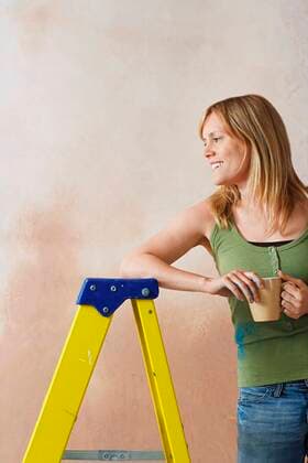 Woman Having Break from Renovating,model released, Symbolfoto,property released 03B74047