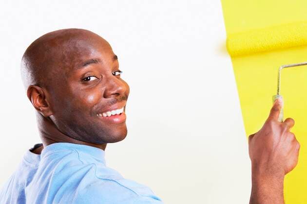 Man Painting Wall Yellow,model released, Symbolfoto,property released 03B76859