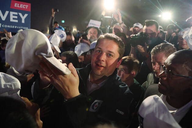Canadian Conservative Party leader Andrew Scheer autographs hats with the Conservative logo for constituents at a rally in Richmond, British Columbia, October 20, 2019 during the last day of federal election campaigning. Election day is tomorrow, October 21, 2019.  VAP2019102024 HEINZxRUCKEMANN