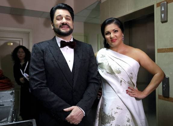 MOSCOW, RUSSIA â€“ OCTOBER 21, 2019: Tenor Yusif Eyvazov (L) and soprano Anna Netrebko before a charity concert titled Dmitri Hvorostovsky and Friends for Children , at the Grand Hall of the Moscow Conservatory. Sergei Karpukhin TASS  TS0BFC52