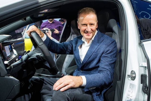 24 10 2019, xtgx, economy car, Volkswagen world premiere presentation Golf VIII 8 eight emspor, v l Herbert Diess at the wheel of the Golf 8 Wolfsburg