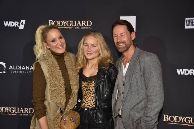 Actress Janine Kunze, l r, her daughter Lili and Dirk Budach come to the premiere and tour start of the musical BODYGUARD in the Musical Dome on 24 10 2019 in Cologne.