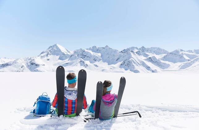Couple of ski tourers having a break in the mountains, Kuehtai, Tyrol, Austria model released Symbolfoto  CVF01516