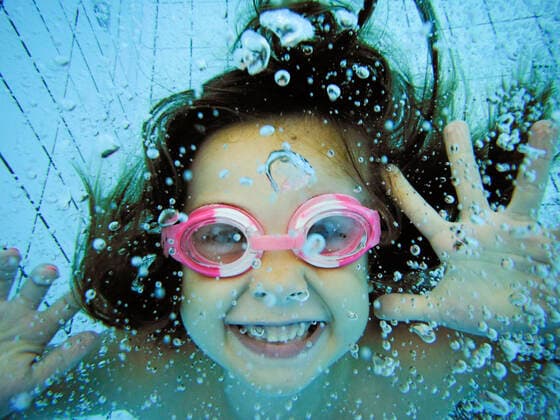 Underwater portrait of a happy girl model released Symbolfoto  XCF00256