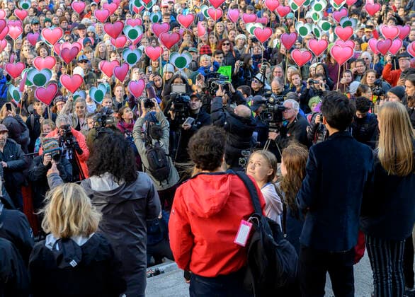 October 25, 2019, Vancouver, BRITISH COLUMBIA, CANADA: Swedish youth climate activist GRETA THUNBERG looks up as thousand gather in downtown Vancouver, British Columbia during a rally as 15 plaintiffs, ages 7-19, who launch a lawsuit today against the Canadian government for their personal injuries as a direct result of the climate change. Vancouver CANADA - ZUMAl31_ 20191025_zaf_l31_012 Copyright: xRobinxLoznakx