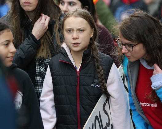 Swedish teen activist Greta Thunberg arrives for the post federal election Friday climate strike march starting and ending at the Vancouver Art Gallery in Vancouver, British Columbia on Friday, October 25, 2019. Organized by local youth-led, Sustainabiliteens, Greta and a turn out of nearly 10,000 climate activists demand action from industry and the various levels of government and are supporting the 15-youth who announced their plans to sue the federal government alleging it has contributed to climate change.  VAP2019102522 HEINZxRUCKEMANN