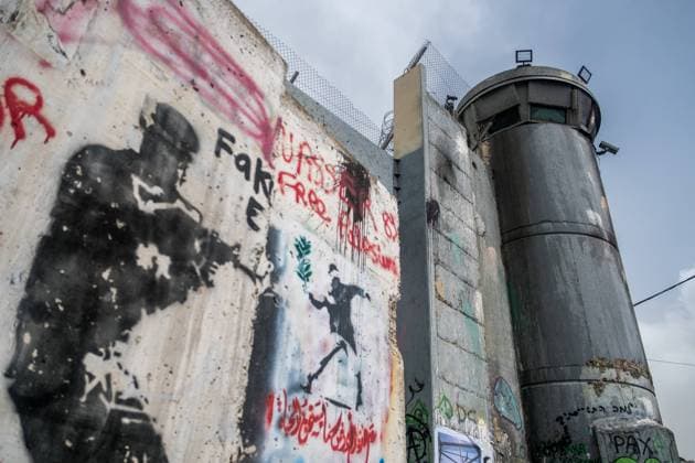 Frescoes, graffiti, drawings, tags and political messages on the separation wall between Israel and the West Bank. The wall has become a tourist attraction especially after the passage of the street artist -Banksy-. March 30, 2019. Bethlehem. Palestine.  MichaelxBunelx xLexPictorium LePictorium_0217686