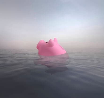 Piggy bank sinks into water  Copyright: xGaryxWatersx 11591869