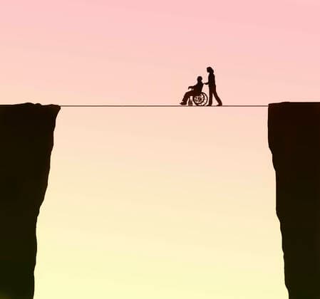 Nurse pushes older man in wheelchair on a wire rope  Copyright: xGaryxWatersx 11591860