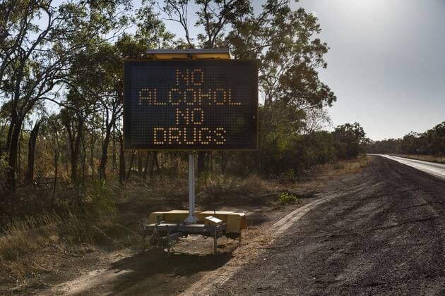No Alcohol No Drugs digital road sign at sunny roadside Australia Northern Territory Barunga  Copyright: TobiasxTitz fStopImages1862006