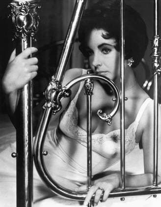 Elizabeth Taylor Characters: Margaret Maggie the Cat Pollitt Film: Cat On A Hot Tin Roof (USA 1958) Director: Richard Brooks 18 September 1958  Copyright: MaryxEvansxAFxArchive 12069756 editorial use only