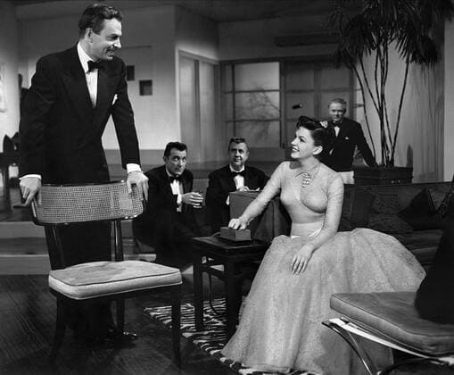 James Mason, Paul Leavitt, Rodney Bell, Judy Garland & Charles Bickford Characters: Norman Maine,,Malibu party guest (uncredited),Vicki Lester & Oliver Niles Film: A Star Is Born (USA 1954) Director: George Cukor 29 September 1954  Copyright: MaryxEvansxAFxArchive 12072292 editorial use only