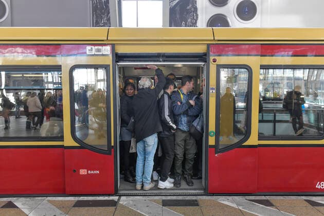 Full S train, platform, Alexanderplatz station, Mitte, Berlin, Germany