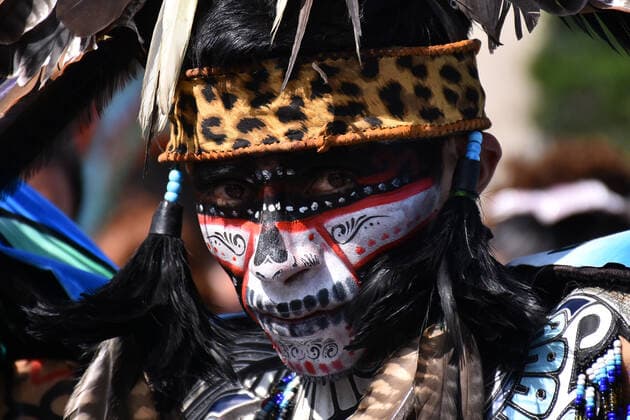 Mega Offering of Dia de Muertos in Mexico MEXICO CITY, MEXICO - NOVEMBER 1: A man with the pre-Hispanic dress poses for photos during the mega offering as part of the Dia de Muertos celebration occasion to remember the dead at Zocalo. on November 1, 2019 in Mexico City, Mexico. This year s anniversary is very close to the 500th anniversary of a bloody event: October 18, 1519  Copyright: xCarlosxTischlerx EYE_3540