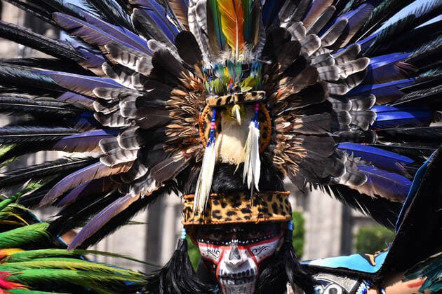 Mega Offering of Dia de Muertos in Mexico MEXICO CITY, MEXICO - NOVEMBER 1: A man with the pre-Hispanic dress poses for photos during the mega offering as part of the Dia de Muertos celebration occasion to remember the dead at Zocalo. on November 1, 2019 in Mexico City, Mexico. This year s anniversary is very close to the 500th anniversary of a bloody event: October 18, 1519  Copyright: xCarlosxTischlerx EYE_3534