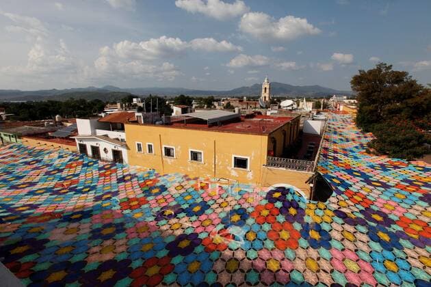 General view of the largest tissue pavilion in the world in the center of the municipality of Etzatlán, Jalisco state Mexico 1 November 2019.Tissue placed within the frame of the patron feasts of the Lord of Mercy, with which they broke a Guinness Record. The participation of more than 200 weavers over eight months, with 24,744 hours of work, allowed them to produce 8,000 pieces that covered 2,832 square meters of fabric. The largest tissue in the world breaks the Guinness record in western Mexico !ACHTUNG: NUR REDAKTIONELLE NUTZUNG!  Copyright: xFranciscoxGuascox AME9130 20191101-637082438928421866