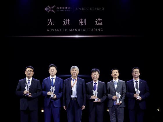 (191102) -- BEIJING, Nov. 2, 2019 -- Awardees of Xplorer Prize in advanced manufacturing field pose for a group photo with the presenter during the 2019 Xplorer Prize award ceremony in Beijing, capital of China, Nov. 2, 2019. The 2019 Xplorer Prizeawards ceremony kicked off here on Saturday. The Xplorer Prize was jointly initiated by Tencent Chairman and CEO Pony Ma and 14 scientists in 2018 to support full-time Chinese mainland-based scientists under age of 45 in areas of fundamental science and cutting-edge technologies. The 50 winners were from 26 organizations across China, including research institutions, universities and an enterprise. Nine of them were under the age of 35. ) CHINA-BEIJING-XPLORER PRIZE-AWARDS CEREMONY (CN) ShenxBohan 