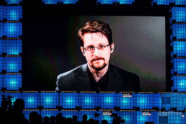 November 4, 2019, Lisbon, Portugal: Edward Snowden, former intelligence officer who served the CIA, NSA, and DIA for nearly a decade as a subject matter expert on technology and cyber security, speaks from Russia to the audience for an interview by James Ball, during the annual Web Summit technology conference in Lisbon. Lisbon Portugal - ZUMAs197 20191104_zaa_s197_161 Copyright: xHenriquexCasinhasx