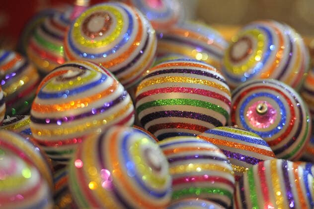 Manufacturing of Christmas Baubles to Christmas Season TLALPUJAHUA MEXICO - NOVEMBER 5: Workers during the manufacture of the christmas baubles in a factory of Tlalpujahua. The magic town of Tlalpujahua is renowned for Christmas baubles created by its artisans.This Town has a long history of creating these festive decorations. In the months leading up to Christmas artisans manufacturing more that 1,000 glass baubles and other decorations a day. The process to make baubles: the glass is heated to 200 degrees Celsius before being blown into a spherical shape. Once they have cooled they are then decorated before being packaged up to be sold all over the world. on November 5, 2019 in Tlalpujahua, Mexico  Copyright: xCarlosxTischlerx EYE_6262
