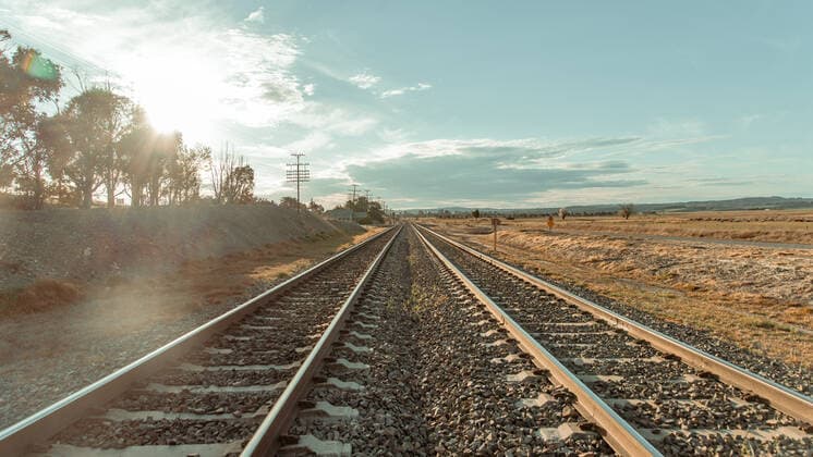 Railway on the horizon and blue sky Australia, New South Wales, Marulan CR_PRLW191008-215598-01