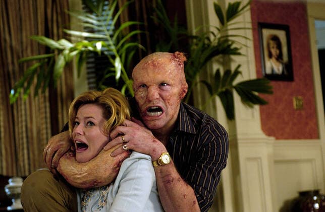 Elizabeth Banks & Michael Rooker Characters: Starla Grant & Grant Grant Film: Slither (USA CAN 2006) Director: James Gunn 31 March 2006  Copyright: MaryxEvansxAFxArchivexGoldxCirclexFilms 12647963 editorial use only