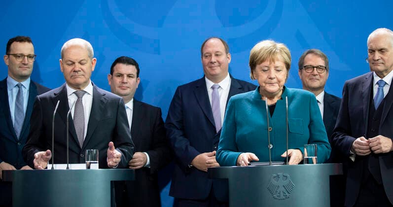 Federal Chancellor Angela Merkel R and Federal Finance Minister Olaf Scholz L at the presentation of the annual report 2019 20 on the overall economic development by the Council of Experts SVR in the Chancellors Office in Berlin on 6 November 2019 Annual report on the overall economic development to the Federal Chancellor