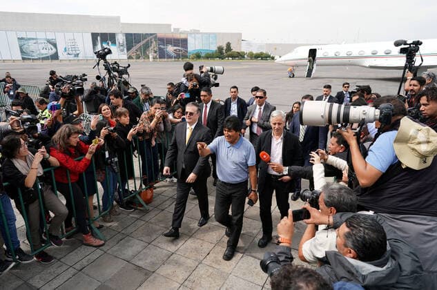 (191112) -- MEXICO CITY, Nov. 12, 2019 -- Evo Morales (C) arrives at the airport in Mexico City, capital of Mexico, on Nov. 12, 2019. Evo Morales, who had been offered political asylum by the Mexican government after announcing his resignation as Bolivian president, arrived in Mexico City on Tuesday. ) MEXICO-MEXICO CITY-EVO MORALES-ARRIVAL DavidxdexlaxPaz 