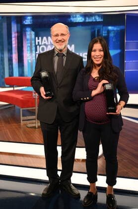 The journalists and award winners Harald Lesch, l r, Mai Thi Nguyen Kim pose at the award ceremony of the Hanns Joachim Friedrichs Preis für Fernsehjournalismus 2019 on 14 11 2019 in Cologne The prize is awarded once a year to television journalists who have achieved outstanding results in their work